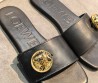 Женские кожаные шлепанцы Loewe черные с золотой пуговицей 2026