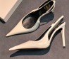 Женские кожаные лакированные туфли Saint Laurent белые 2026