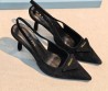 Женские замшевые туфли Prada черные с открытой пяткой 2026