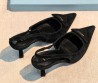 Женские замшевые туфли Prada черные с открытой пяткой 2026
