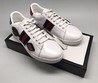 Женские кожаные кроссовки Gucci белые украшены рисунком (стрела)