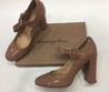 Кожаные женские лакированные туфли Gianvito Rossi коричневые