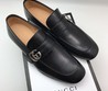 Мужские кожаные лоферы Gucci черные с металлической пряжкой