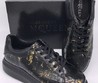 Мужские лаковые кожаные кроссовки Alexander McQueen черные