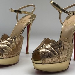 Кожаные босоножки на платформе Christian Louboutin золотые