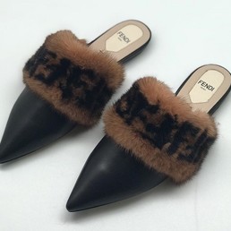 Кожаные мюли с мехом Fendi черные