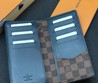 Бумажник Louis Vuitton из коричневой канвы