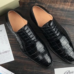 Мужские туфли из кожи крокодила Brioni черные