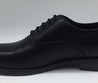 Мужские осенние кожаные туфли Prada черные