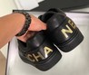 Черные кожаные кроссовки Chanel женские