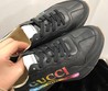 Кроссовки черные Gucci Rhyton с принтом