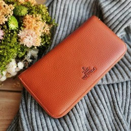 Кожаный кошелек Prada оранжевый