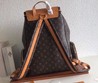 Женский кожаный рюкзак Louis Vuitton коричневый