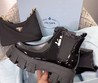 Кожаные черные ботинки Prada