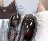 Кожаные черные ботинки Prada