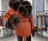 Оранжевое пальто с мехом финского песца