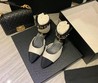 Женские туфли Chanel белые с черным носом